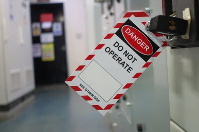 lockout tagout procedures - showing a red and white "Do not operate" tag